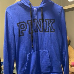Pink zip up hoodie.